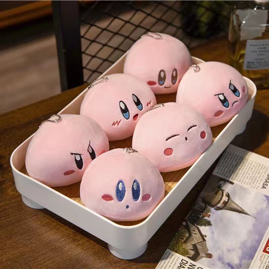 Kirby avec 6 petites poupées en peluche