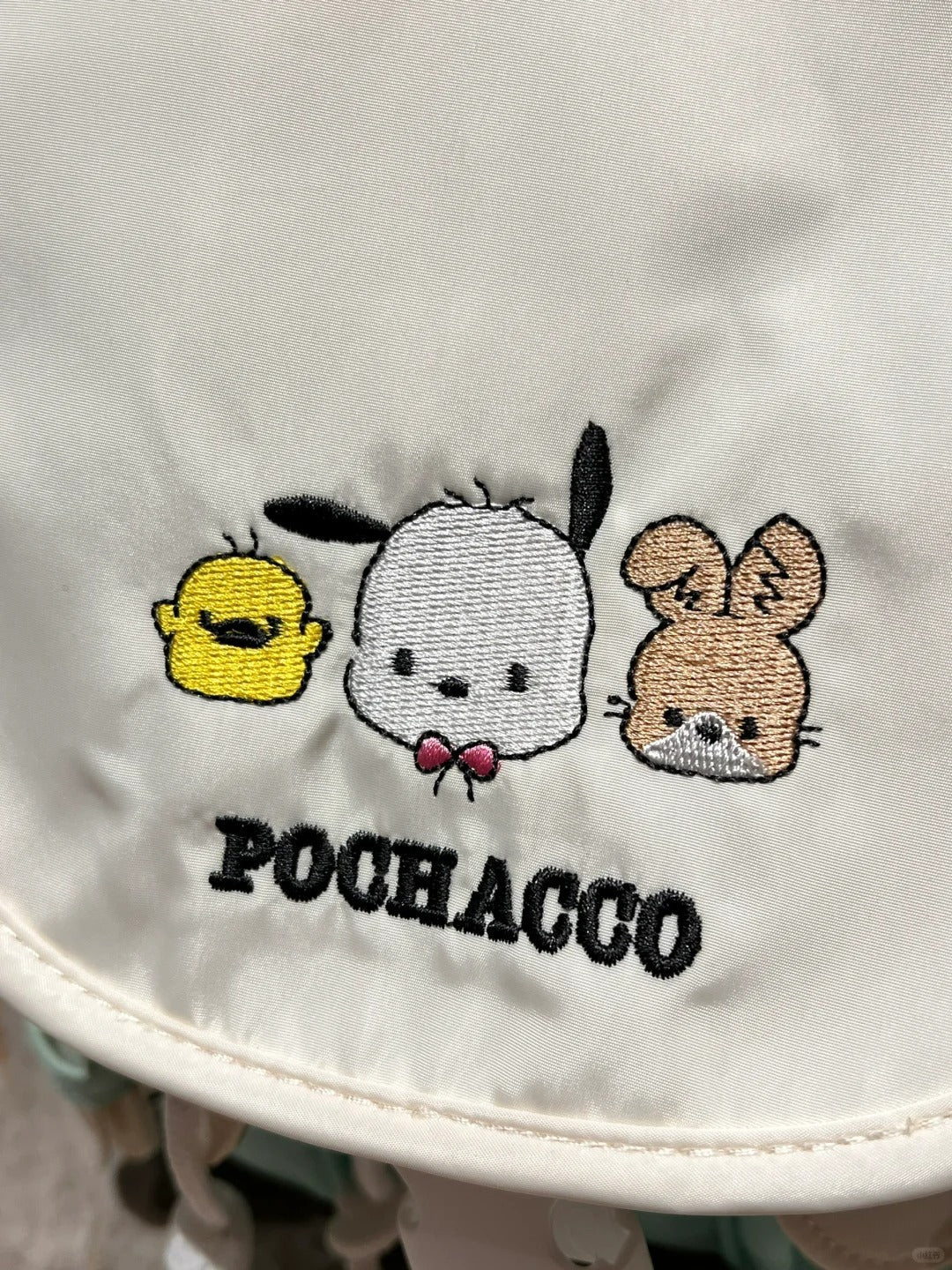 Sac à dos brodé avec un dessin animé mignon