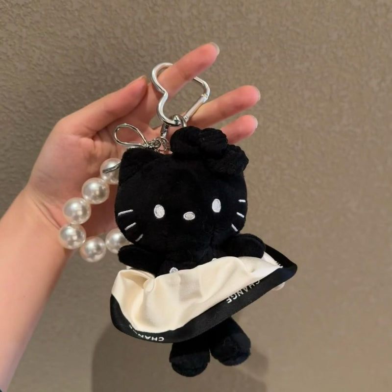 Porte-clés Chaton en robe à pois noirs KI677