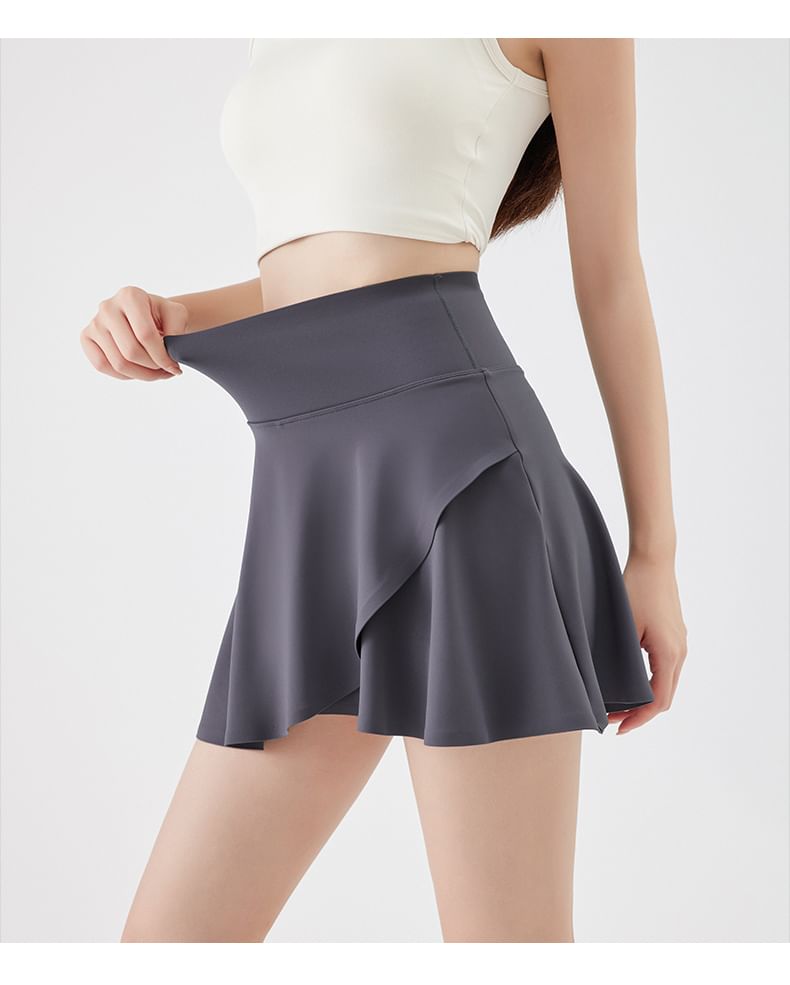 Asymmetric Sports Mini Skirt with Built-In Shorts