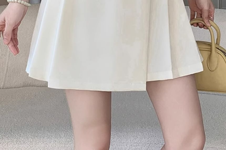 Pleated Solid A-Line Mini Skirt with High Rise