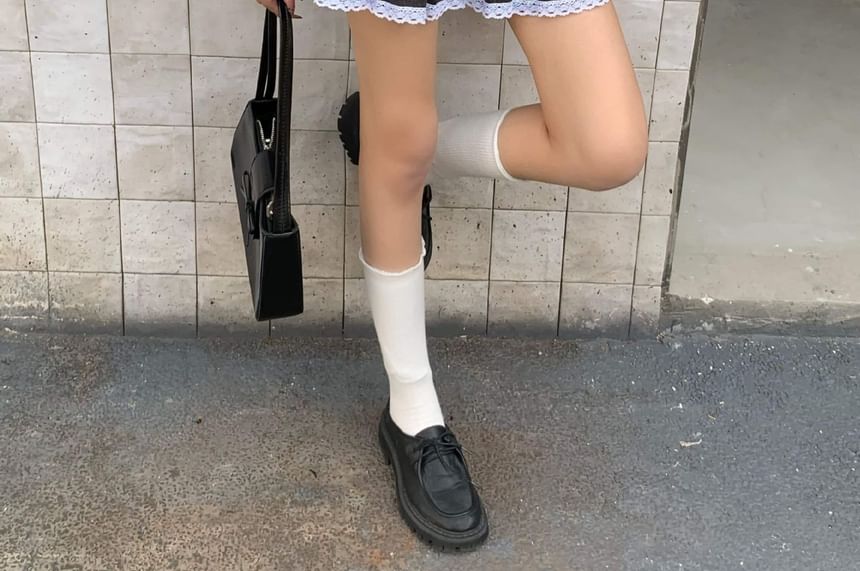 Elevated Waist Contrast Lace Trimmed Pleated Mini Skirt