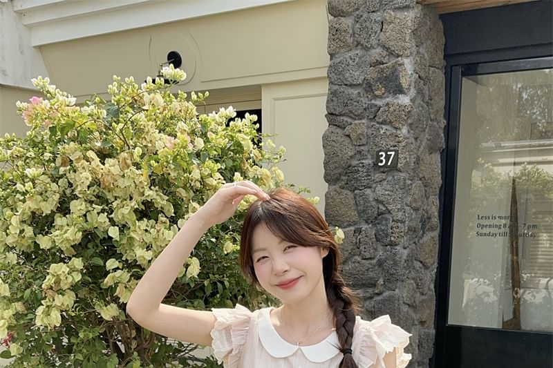 Ruffled Round Neck Short-Sleeve Top Paired with High-Rise Tiered Mini Skirt