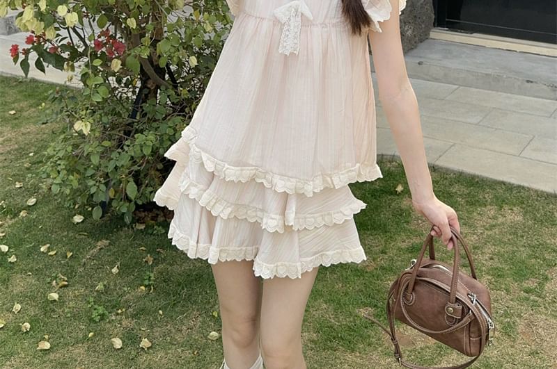 Ruffled Round Neck Short-Sleeve Top Paired with High-Rise Tiered Mini Skirt