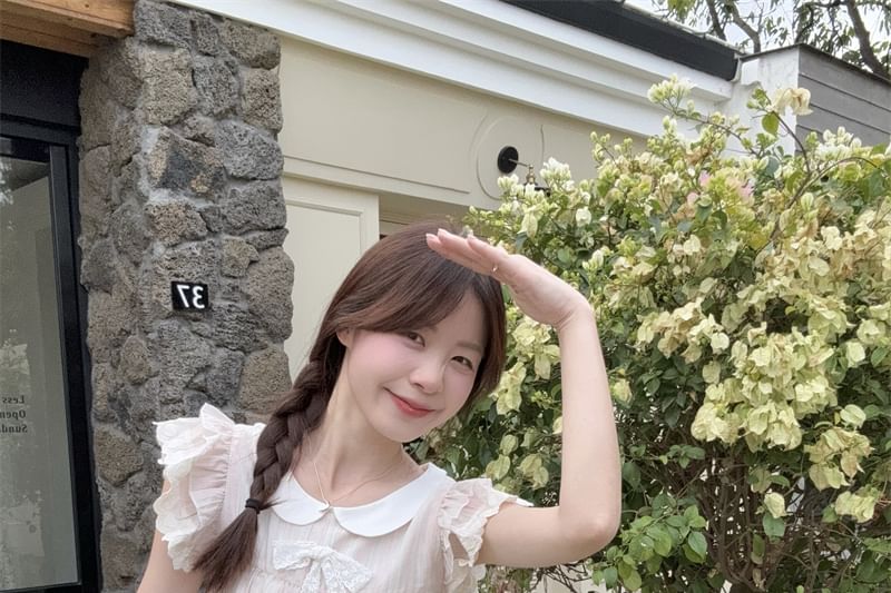 Ruffled Round Neck Short-Sleeve Top Paired with High-Rise Tiered Mini Skirt