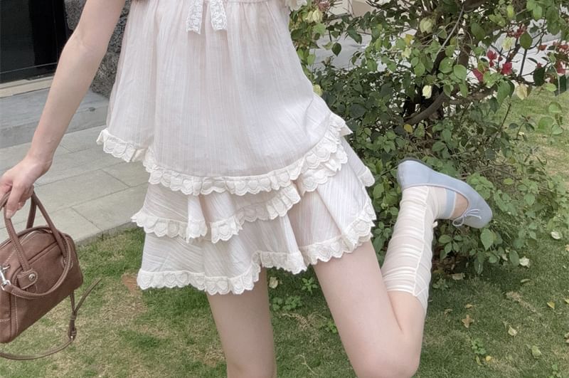 Ruffled Round Neck Short-Sleeve Top Paired with High-Rise Tiered Mini Skirt