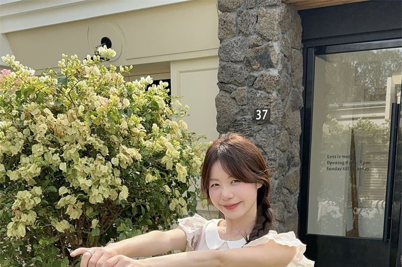 Ruffled Round Neck Short-Sleeve Top Paired with High-Rise Tiered Mini Skirt