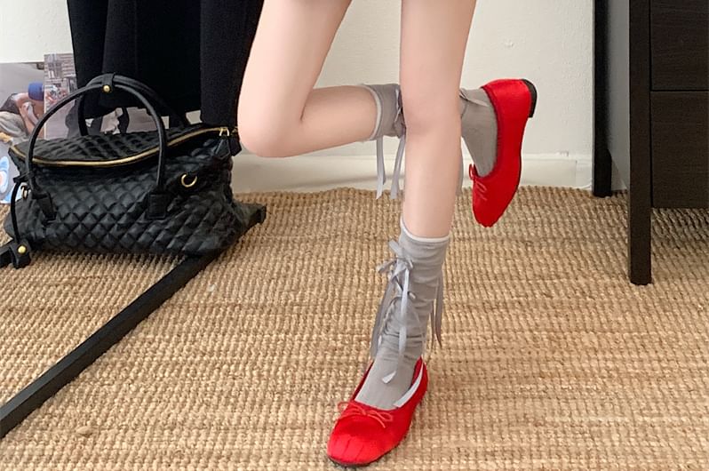 Double-Belted High-Waist Pleated Mini Skirt with Chic Detail