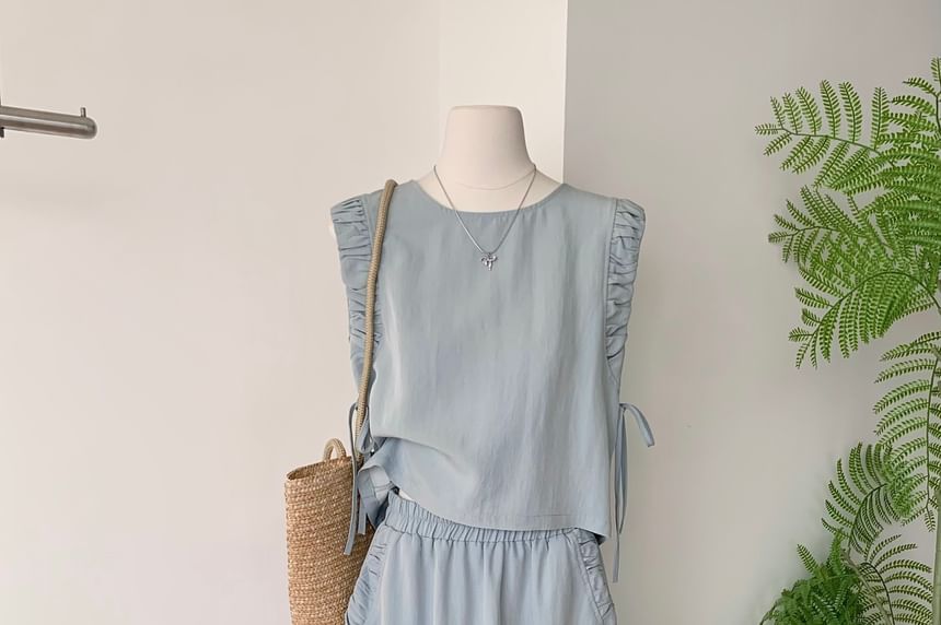 Sleeveless Ruffle-Trim Blouse with Drawstring and Elastic Waist Midi A-Line Skirt Set