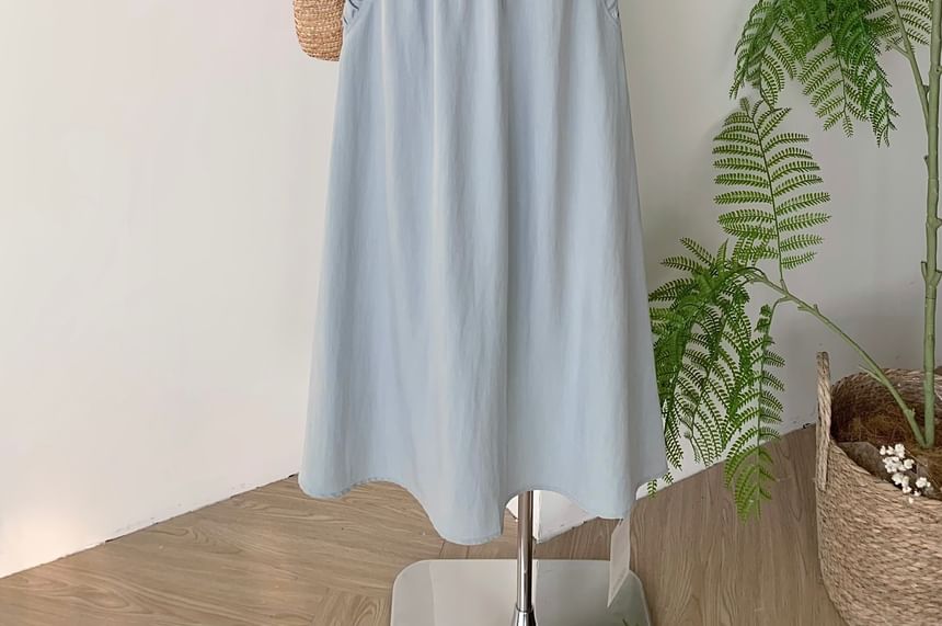 Sleeveless Ruffle-Trim Blouse with Drawstring and Elastic Waist Midi A-Line Skirt Set