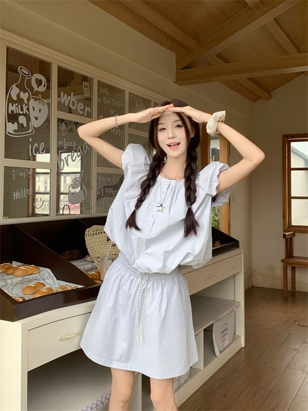 Shirred Puff-Sleeve Top Paired with High-Rise Mini Skirt