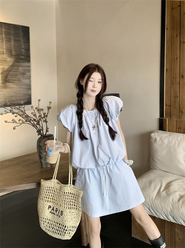 Shirred Puff-Sleeve Top Paired with High-Rise Mini Skirt