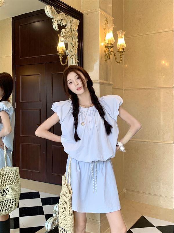 Shirred Puff-Sleeve Top Paired with High-Rise Mini Skirt