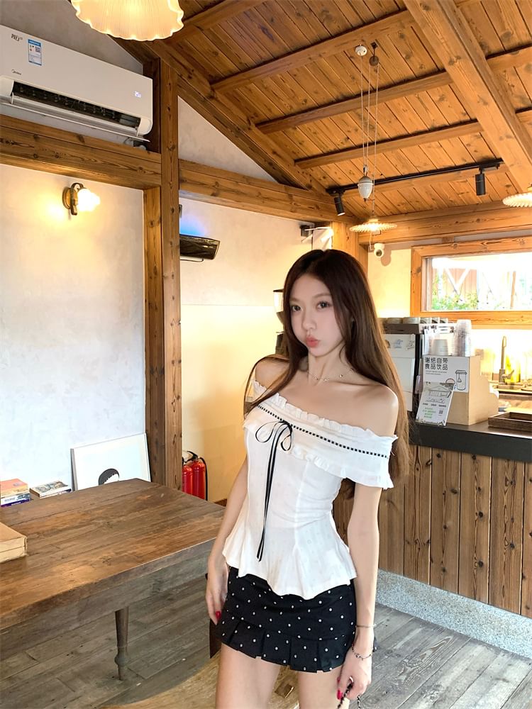 Frill-Trimmed Off-Shoulder Peplum Cropped Top with Dotted Pleated Mini Skirt