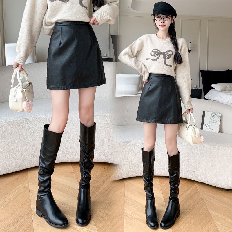 High Rise Faux Leather A-Line Mini Skirt