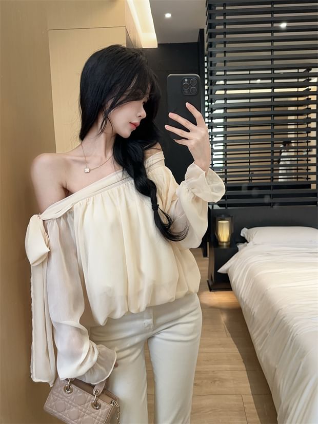 Off-Shoulder Bow Blouse with Asymmetrical Neckline and Long Sleeves