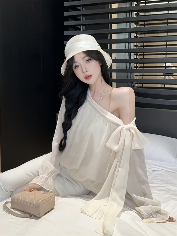 Off-Shoulder Bow Blouse with Asymmetrical Neckline and Long Sleeves