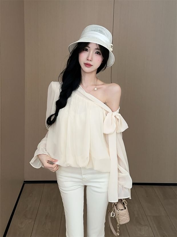 Off-Shoulder Bow Blouse with Asymmetrical Neckline and Long Sleeves