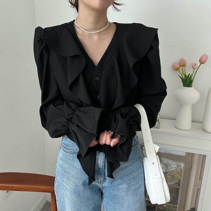 Ruffle-Trimmed Blouse with V-Neckline & Extended Sleeves