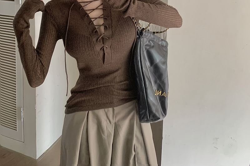 Ribbed Knit Top with Lace-Up V-Neck and Extended Sleeves