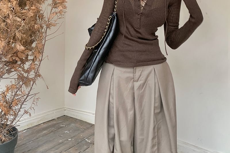 Ribbed Knit Top with Lace-Up V-Neck and Extended Sleeves