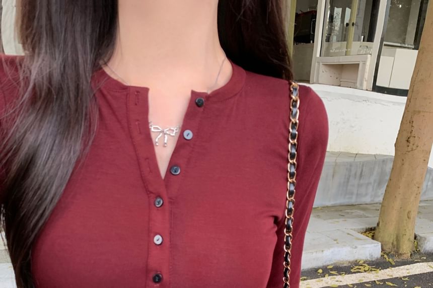 Classic Henley Tee with Long Sleeves and Solid Color Design
