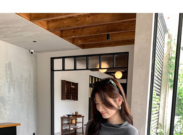 Knit Top with Mock Neck and Cape Sleeves in Solid Color