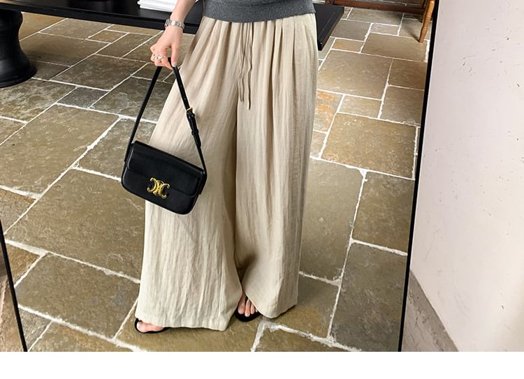 Knit Top with Mock Neck and Cape Sleeves in Solid Color