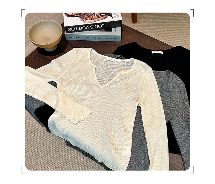 Knit Top with Notch Neck and Long Sleeves in Solid Color