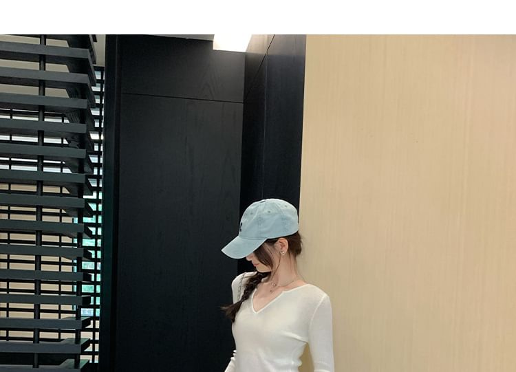 Knit Top with Notch Neck and Long Sleeves in Solid Color