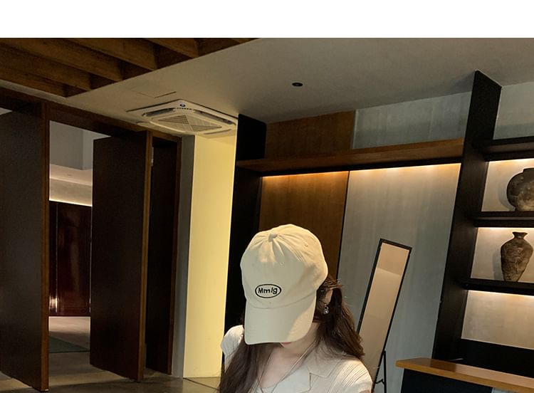 Slim-Fit Knit Top with Cap Sleeves and Notch Lapel in Solid Color