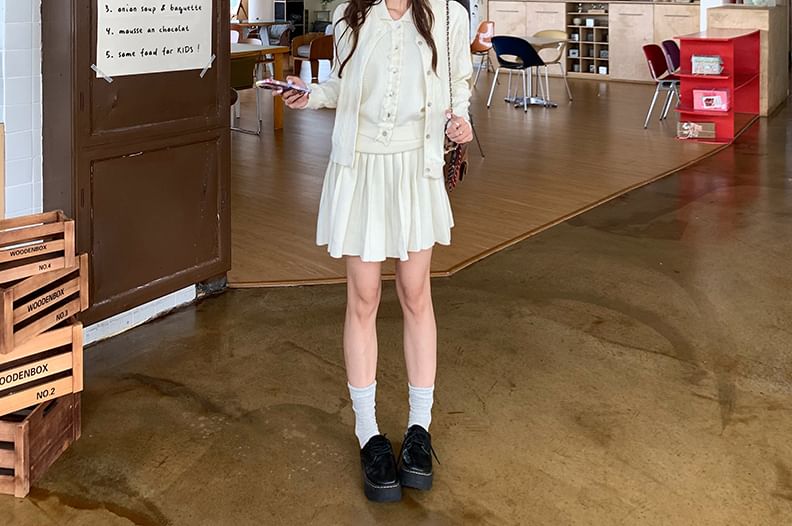 Sleeveless Collared Frill Trim Crop Knit Top / Round Neck Button-Up Plain Cable Knit Cardigan / High Rise Pleated Mini A-Line Skirt