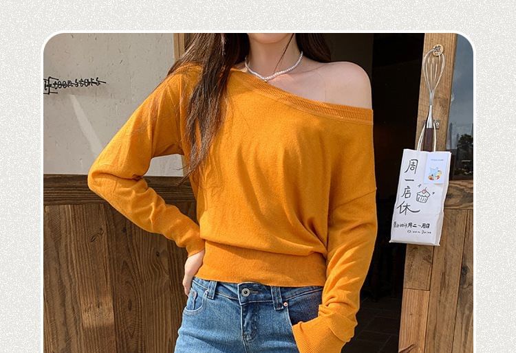 Classic Knit Top with Boat Neckline and Long Sleeves