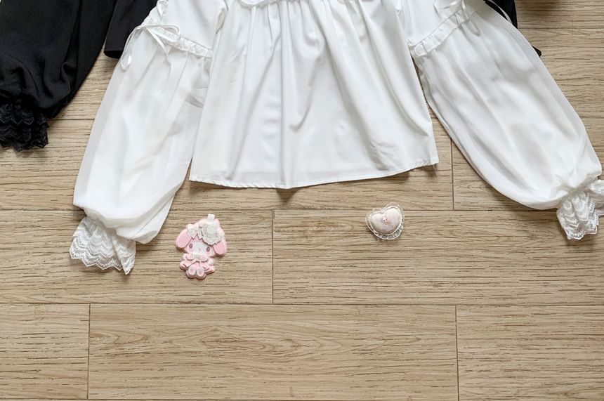 Puff-Sleeve Blouse with Lace Ruffle and Button Front