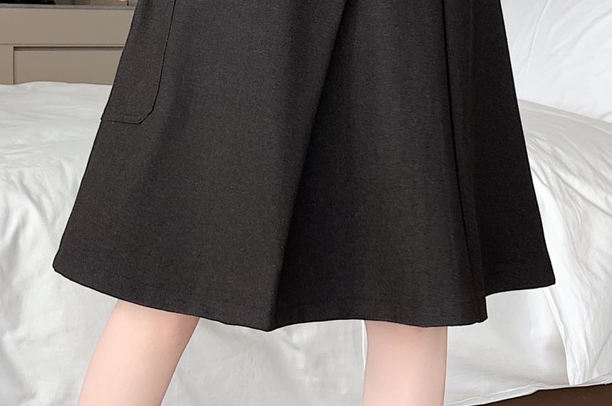 High-Rise Asymmetrical A-Line Midi Skirt