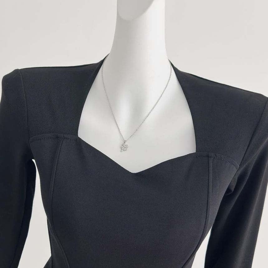 V-Neck Crop Top and Faux Leather Skirt Set