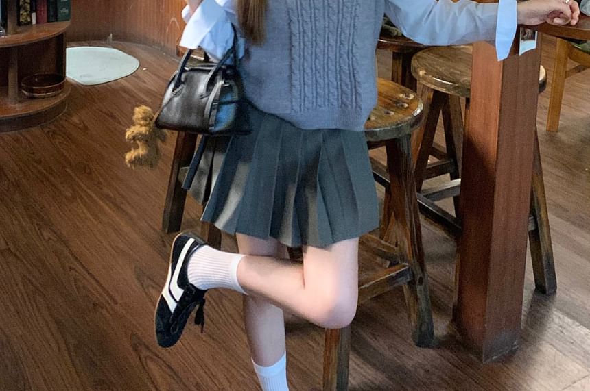 Crew Neck Long-Sleeve Button-Up Shirt with Mini Pleated Skirt & Cable Knit Vest