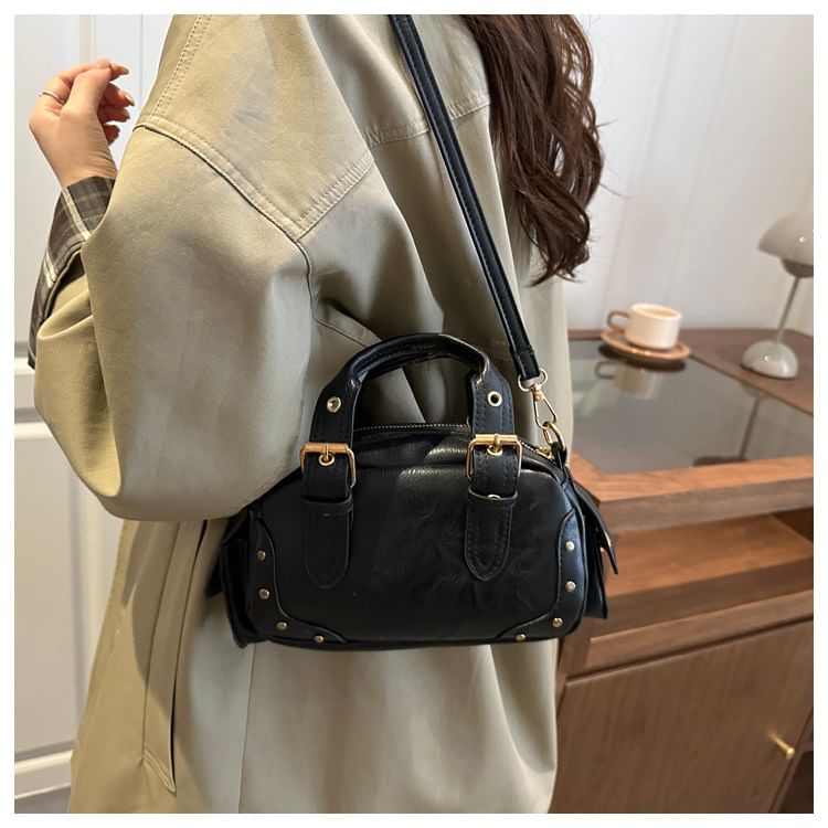 Studded Buckled Flap Pocket Crossbody Bowler Bag