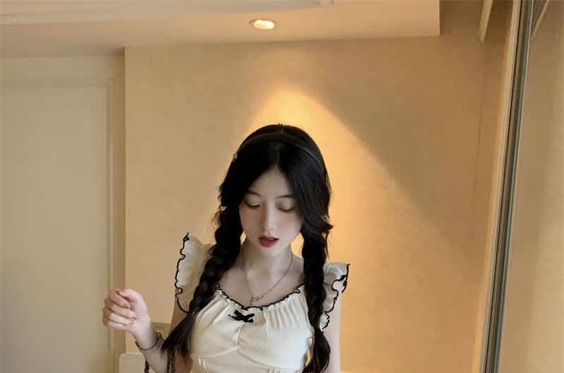Ruffle-Trim Sleeveless Top with Pleated Mini Skirt