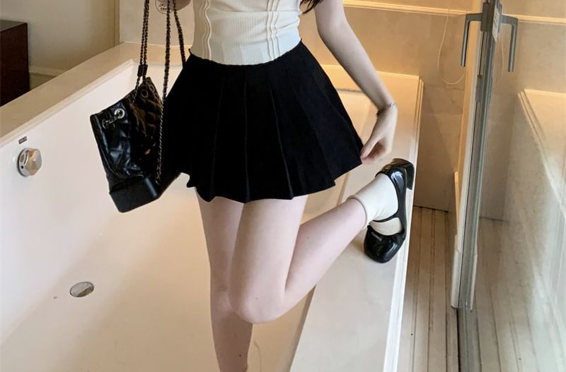Ruffle-Trim Sleeveless Top with Pleated Mini Skirt