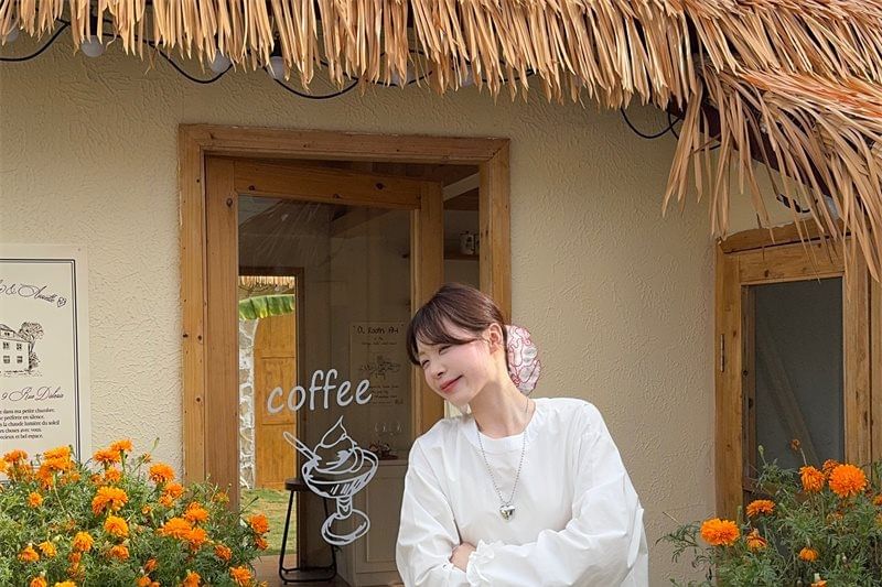 Ruffle-Trim Round-Neck Blouse with Long Sleeves