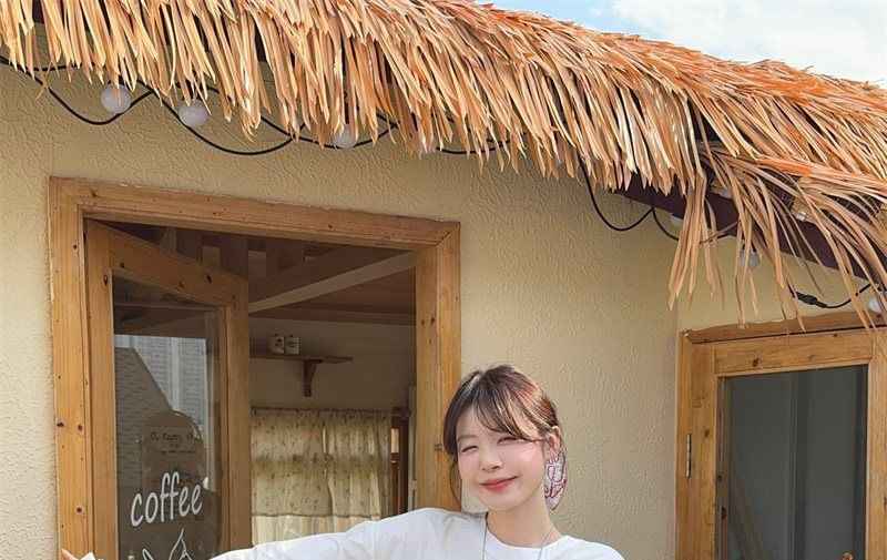 Ruffle-Trim Round-Neck Blouse with Long Sleeves