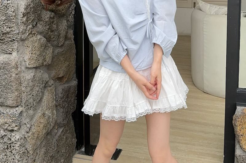 Long-Sleeved Round Neck Asymmetrical Lace Blouse