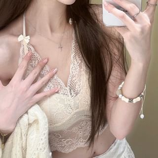 Bow-Adorned Halter Neck Blouse with Lace Detailing