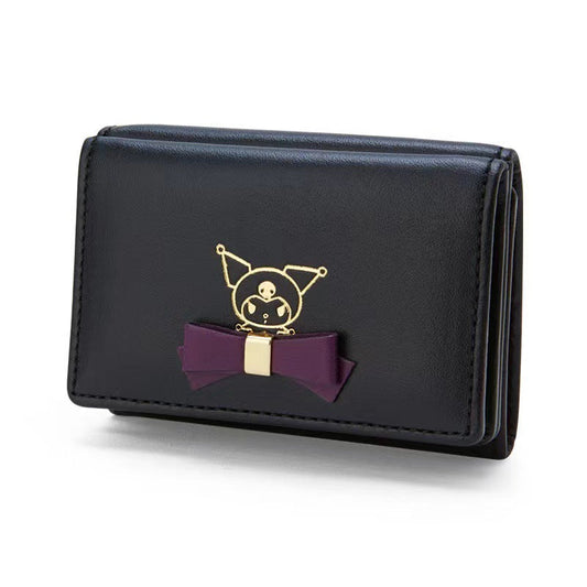 Melo et Kuro avec un portefeuille à nœud