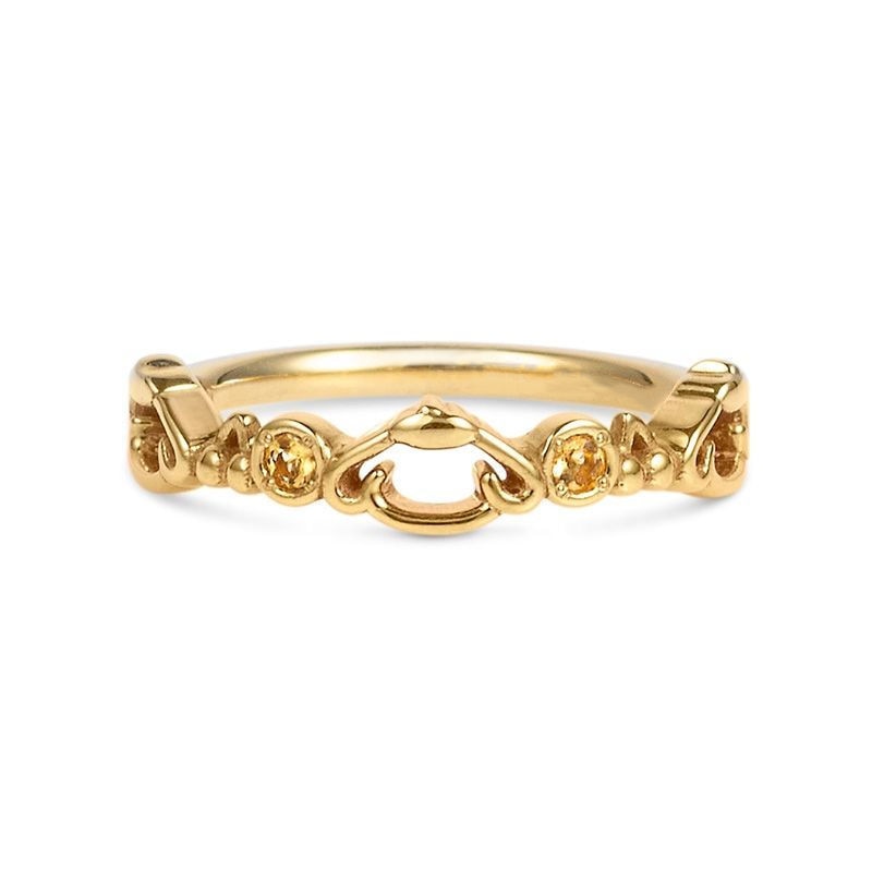 Verstellbarer goldener Ring mit Pom