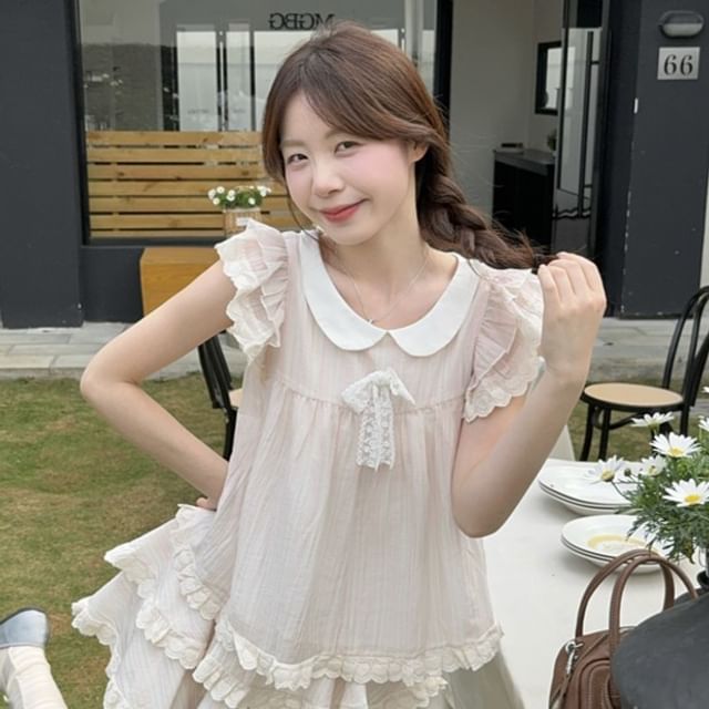 Ruffled Round Neck Short-Sleeve Top Paired with High-Rise Tiered Mini Skirt