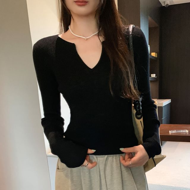 Knit Top with Notch Neck and Long Sleeves in Solid Color