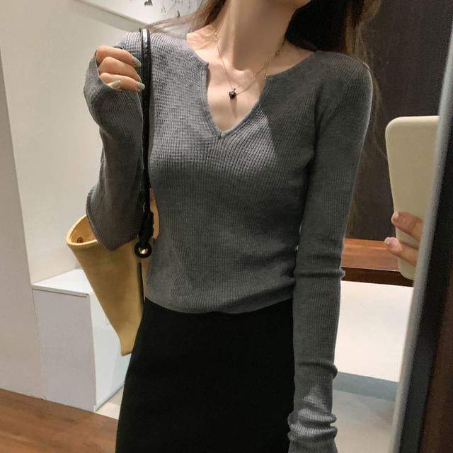 Knit Top with Notch Neck and Long Sleeves in Solid Color