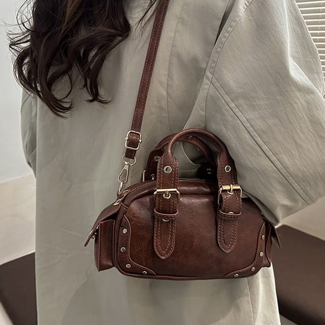 Studded Buckled Flap Pocket Crossbody Bowler Bag